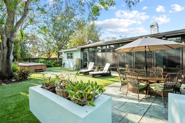 9466 127th Ave, Largo, FL 33773 - view of patio / terrace with a hot tub and outdoor dining space