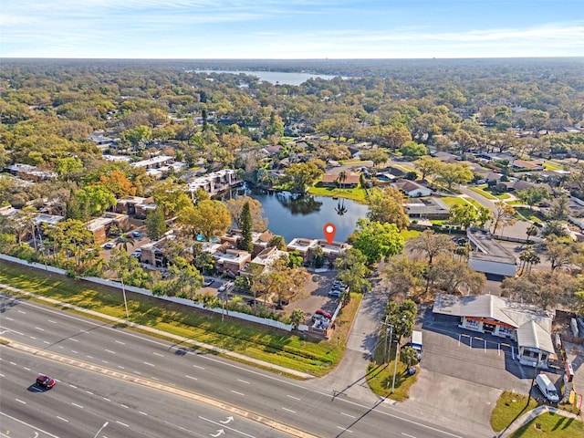 aerial view with a residential view and a water view