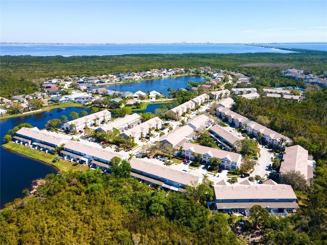 aerial view with a residential view and a water view