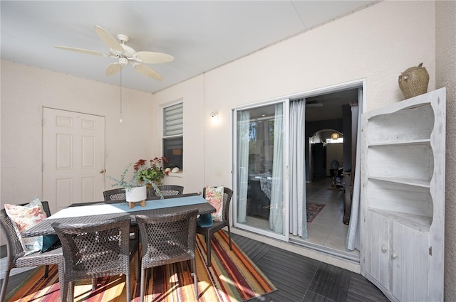 dining area featuring a ceiling fan