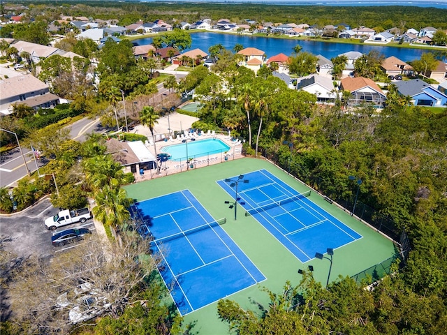 aerial view featuring a residential view and a water view