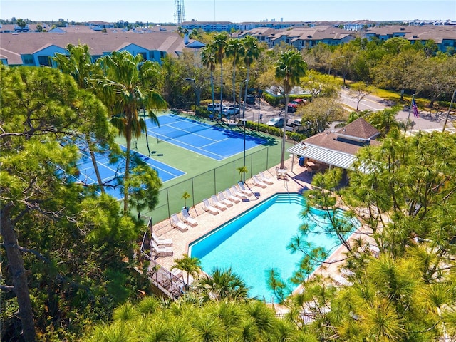 birds eye view of property with a residential view