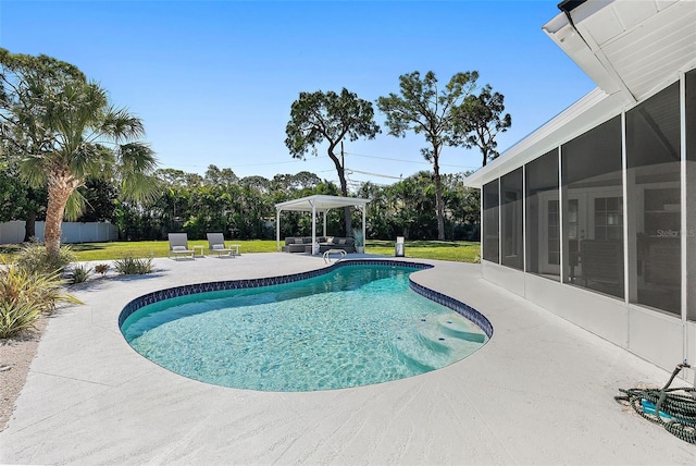 view of pool with a patio area, a lawn, a fenced in pool, and a sunroom