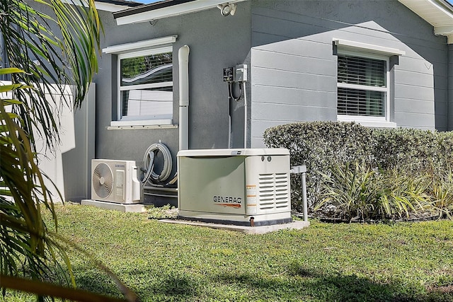 exterior details with ac unit, stucco siding, and a power unit