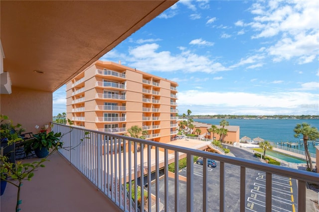 balcony featuring a water view