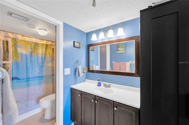 bathroom featuring visible vents, toilet, a textured ceiling, a shower with shower curtain, and vanity