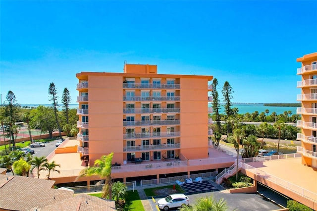 view of building exterior with a water view