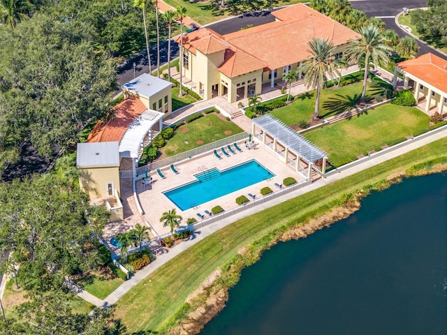 birds eye view of property with a water view