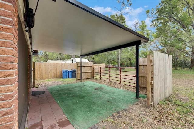 view of yard featuring a patio area and fence