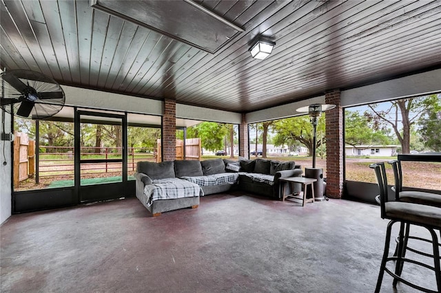 sunroom featuring a healthy amount of sunlight