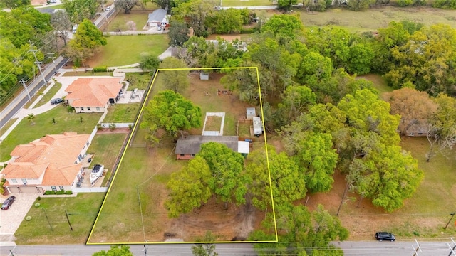 birds eye view of property with a residential view