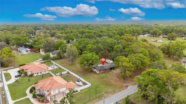 bird's eye view featuring a view of trees