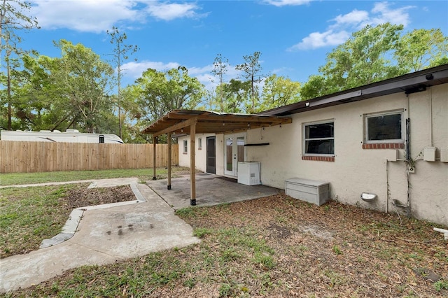 view of yard with a patio area and fence