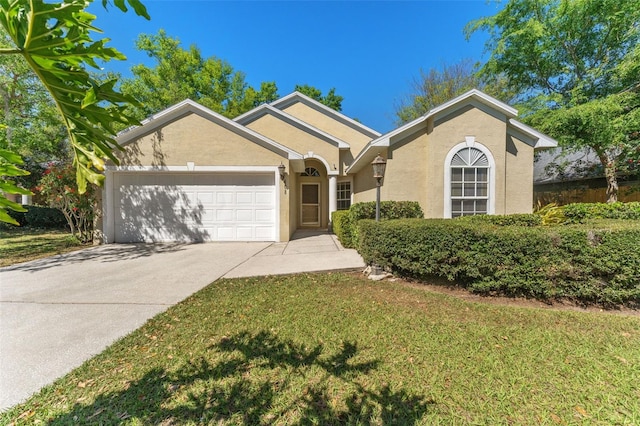 ranch-style home with a front yard, an attached garage, driveway, and stucco siding