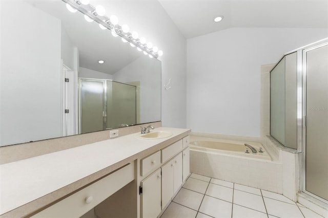 full bathroom with a shower stall, a bath, tile patterned flooring, and vaulted ceiling