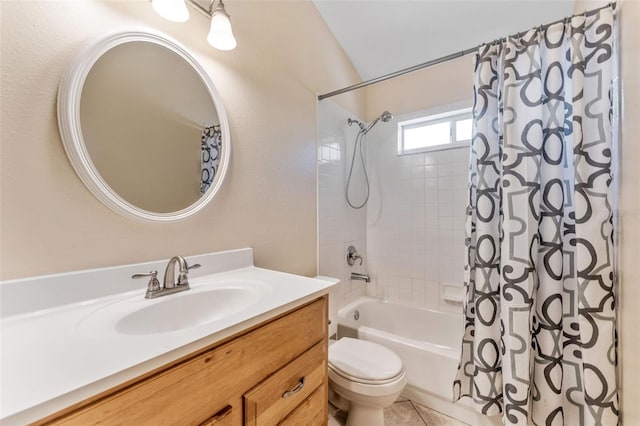 bathroom with tile patterned floors, shower / bath combo with shower curtain, toilet, and vanity