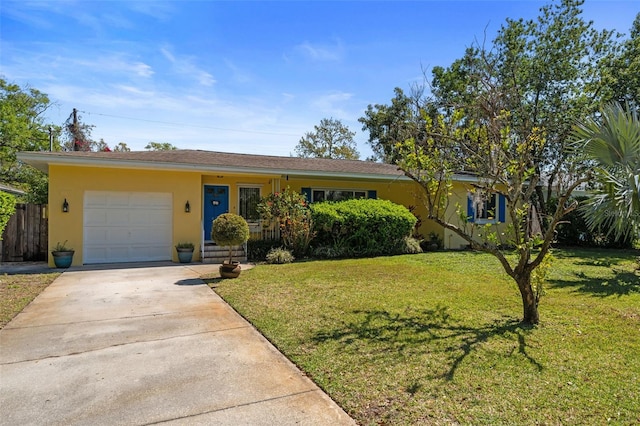 single story home with a front yard, fence, an attached garage, stucco siding, and concrete driveway