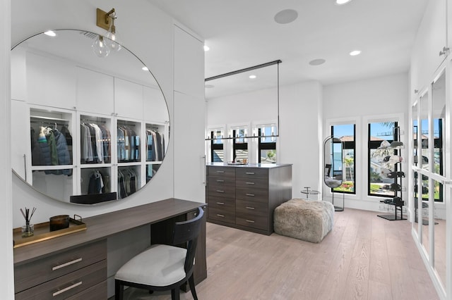 office area with recessed lighting and light wood-style flooring