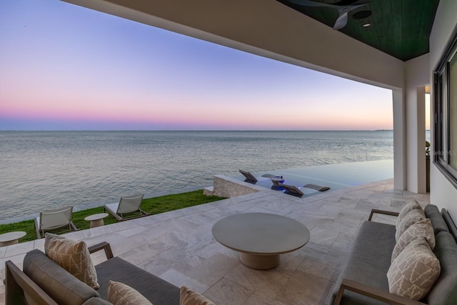 view of patio / terrace with a water view