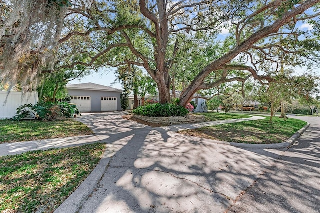 view of front of property with stucco siding and fence