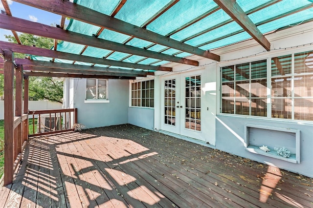 deck with fence, french doors, and a pergola