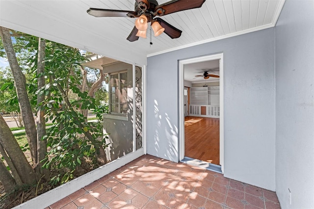 interior space featuring ceiling fan