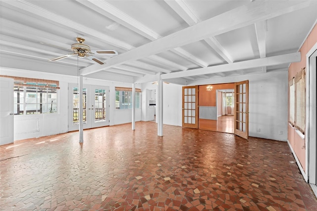 interior space featuring a ceiling fan, beamed ceiling, and french doors