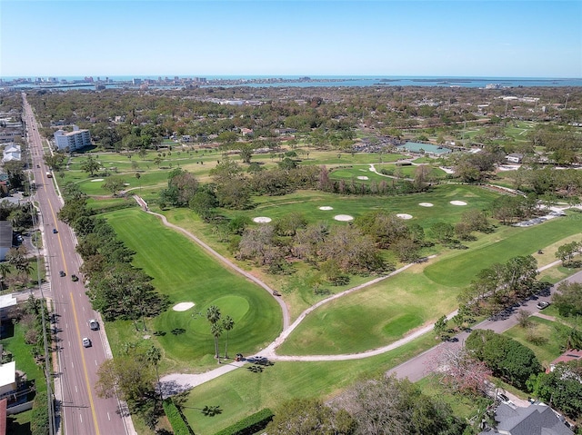 aerial view with a water view and golf course view