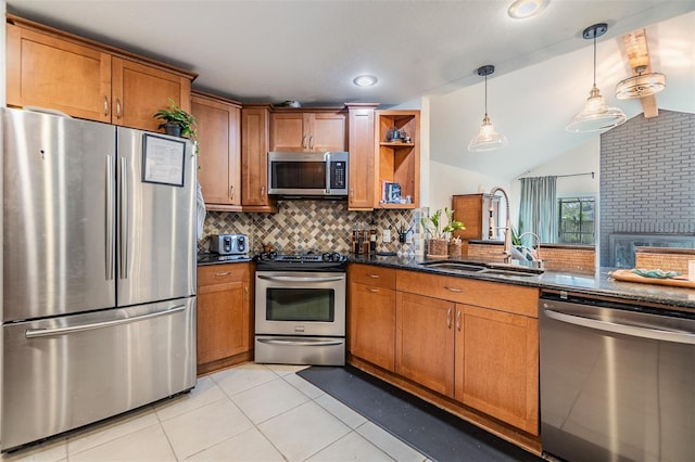 kitchen featuring light tile patterned flooring, brown cabinetry, backsplash, and stainless steel appliances