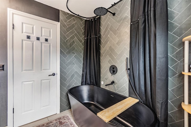 bathroom with tile walls