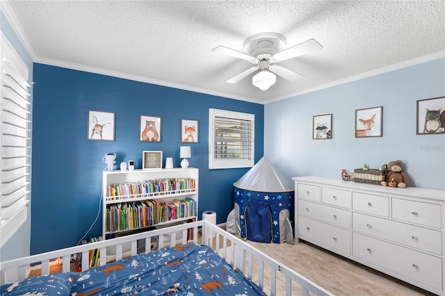 carpeted bedroom featuring ceiling fan, crown molding, and a textured ceiling