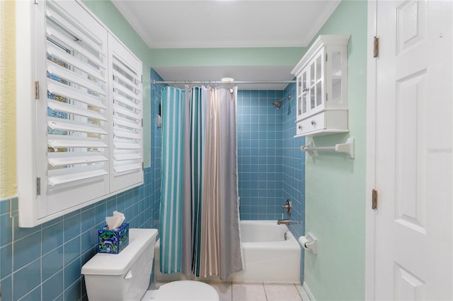 bathroom featuring ornamental molding, tile patterned floors, toilet, tile walls, and shower / tub combo with curtain