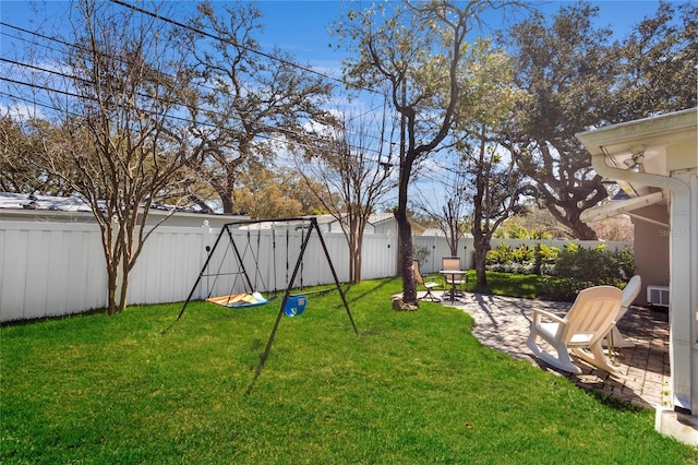 view of yard with a patio area and a fenced backyard