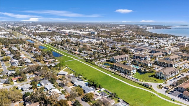 aerial view with a residential view and a water view