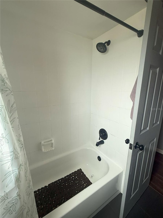 full bathroom with shower / bathtub combination with curtain