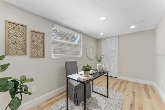 office area with recessed lighting, baseboards, and wood finished floors