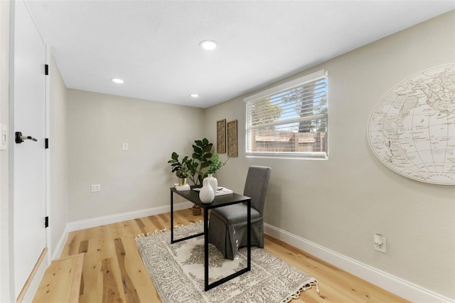 office with recessed lighting, baseboards, and light wood-style flooring