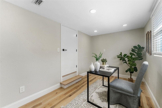 office with recessed lighting, visible vents, baseboards, and light wood-style floors