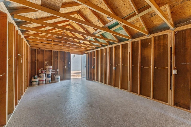 miscellaneous room featuring lofted ceiling