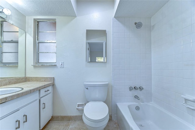 full bath with toilet, vanity, bathtub / shower combination, tile patterned floors, and a textured ceiling