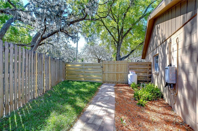 view of yard with a fenced backyard