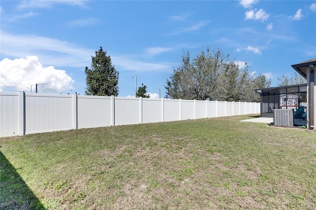 view of yard featuring cooling unit and a fenced backyard