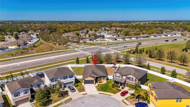 birds eye view of property with a residential view