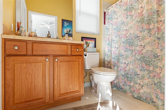 bathroom featuring a shower with curtain, toilet, vanity, and tile patterned flooring