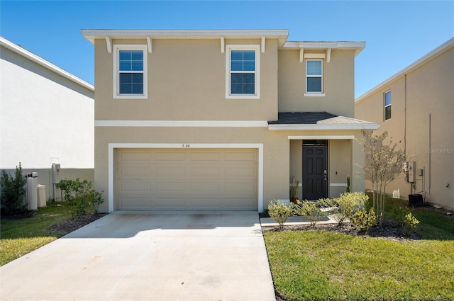 traditional-style home featuring stucco siding, driveway, and an attached garage