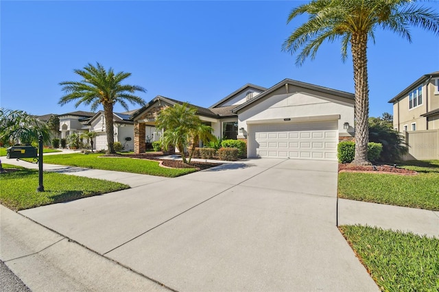 view of front of house with stucco siding, a front lawn, a residential view, concrete driveway, and a garage