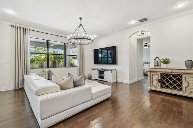 living room featuring dark wood finished floors, visible vents, and a ceiling fan