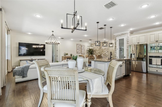 dining space featuring recessed lighting, visible vents, dark wood-style flooring, and ornamental molding