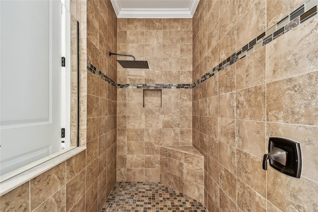 full bath featuring tiled shower and crown molding