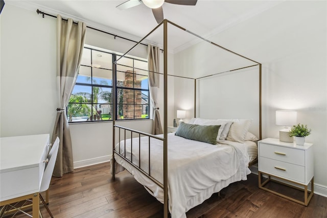 bedroom with dark wood-type flooring, baseboards, and ceiling fan